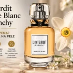 Perfume L’Interdit Narcisse Blanc Givenchy em cenário com flores brancas, destacando fragrância floral elegante e luminosa